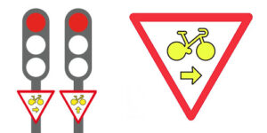 Cédez le passage cyclistes au feu rouge